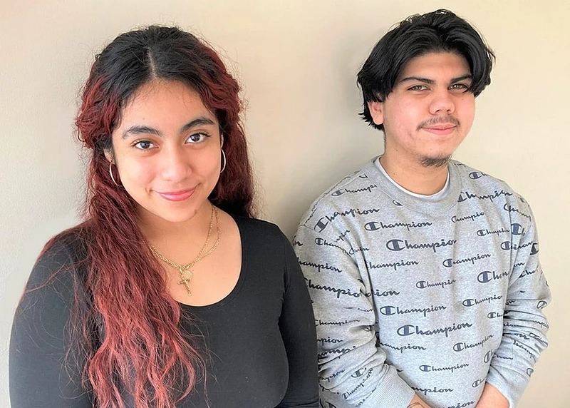 two tulsa genesys works students smililng